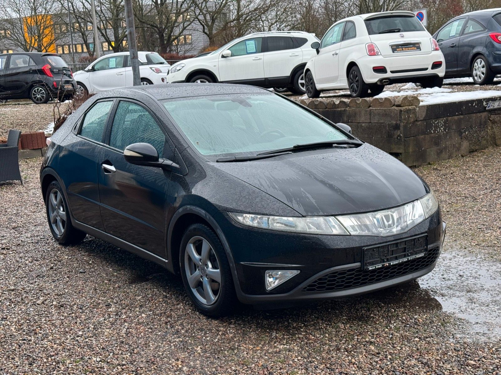 Fahrzeugabbildung Honda Civic Lim. 5-trg. 1.4 **Sport**HU 12/2026**Carpl
